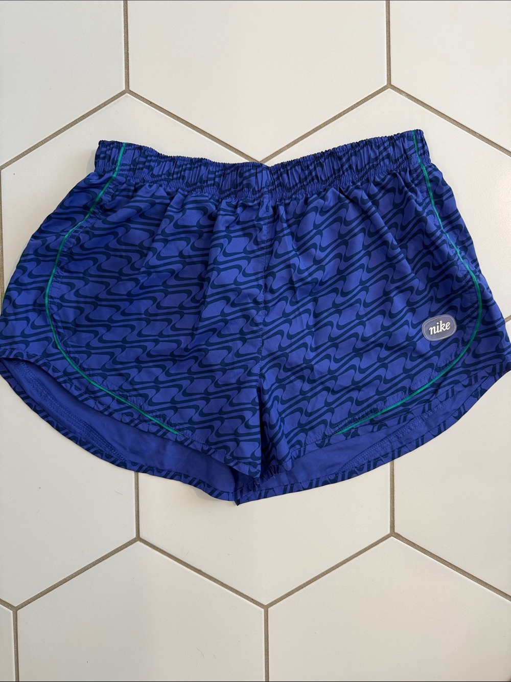 Nike Women's Blue Wave-Pattern Athletic Shorts with Green Trim